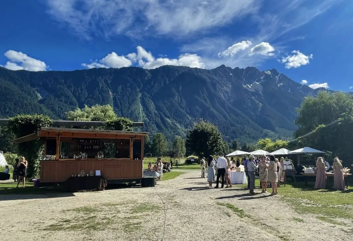 The Boombox mobile bar at North Arm Farm in Pemberton with Mount Currie behind