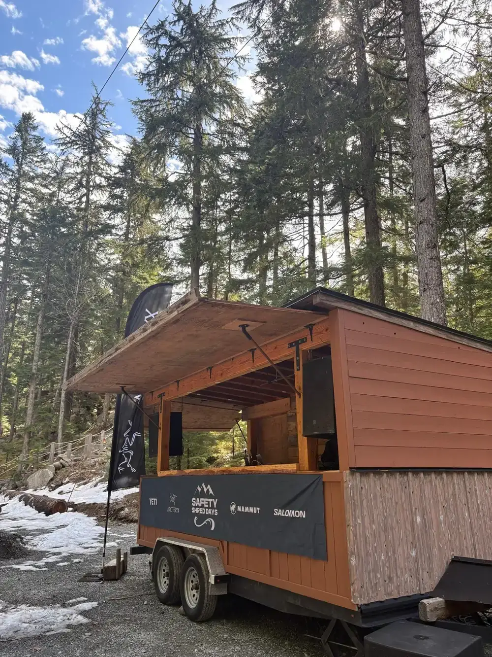 Side view of the Boombox trailer at Safety Shred Days in spring snow